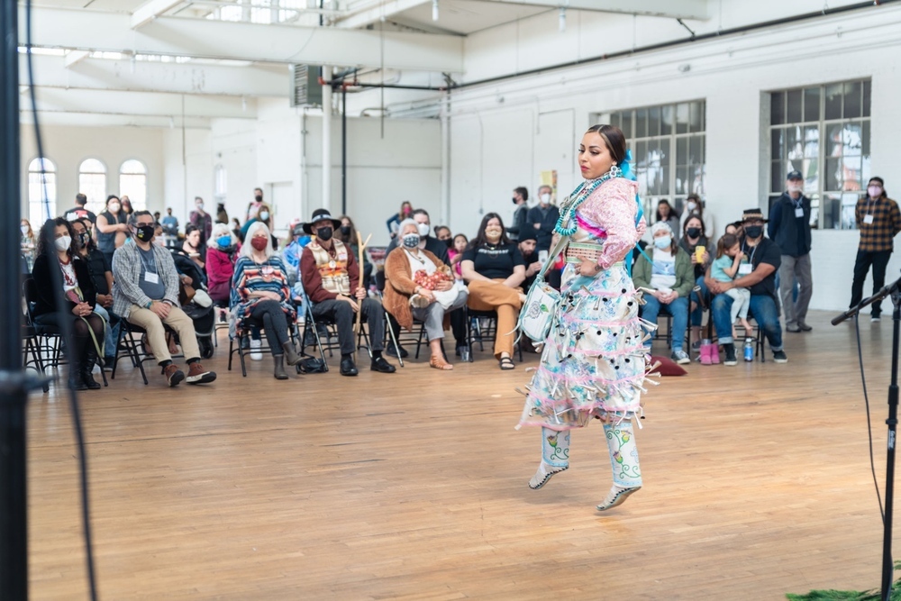 A dancer performs at The Center for Native Arts and Cultures.