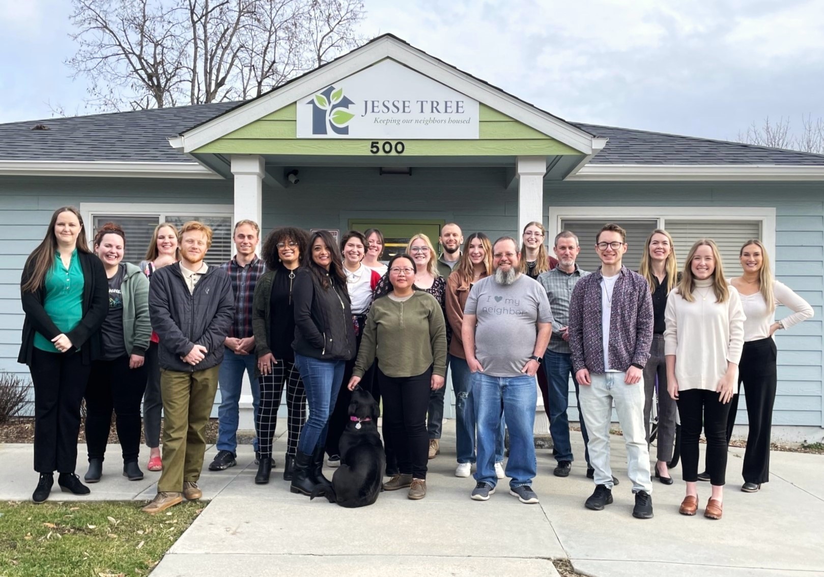 Group photo of Jesse Tree of Idaho staff  standing outside in front of their building